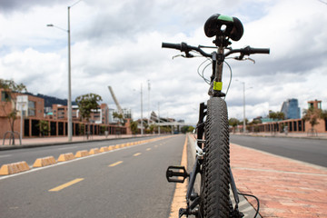 Bogotá Landscape with Bicycle path name as "cicloruta" and Black Mountain Bike. 