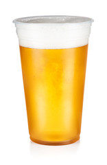Beer, ale or lager in a plastic disposable cup isolated on white background