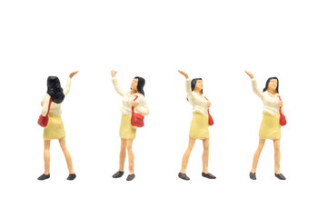Miniature figurine character as passenger standing and posing in posture isolated on white background.