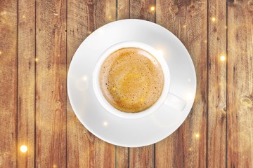 Cup of coffee on wooden background