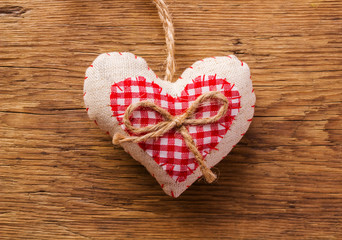Heart on a rustic wooden background