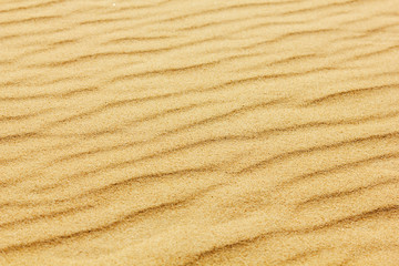 closeup of sand pattern of a beach