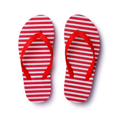 Beach rubber footwear isolated on white background. Summer plastic flip flops for travel.