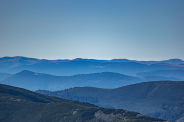 Obraz na płótnie Canvas Mountains in the blue haze