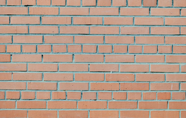 Brick wall.Stone wall of bricks of different colors.