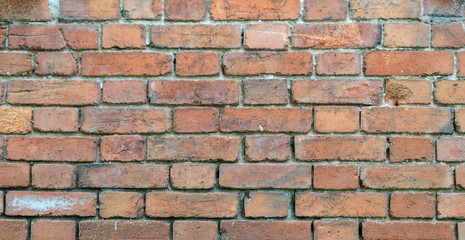 Brick wall.Stone wall of bricks of different colors.