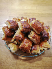 Chocolate pastry in a glass bowl on the wooden table