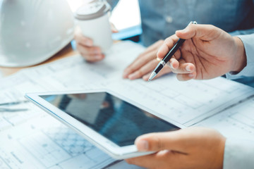 Engineer meeting for architectural with tablet project and working with partner engineering on...