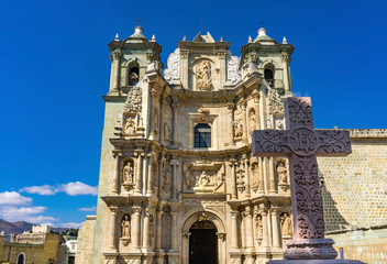 Fototapeta na wymiar Stone Cross Basilica Our Lady Solitude Facade Church Oaxaca Mexico