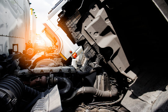 trucks an opening the engine for repairing and maintenance.