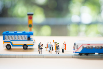 Miniature people: Traffic within the capital between people and public bus or train