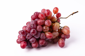 Bunch ripe red grape isolated on white background.