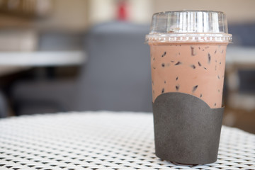 Iced coffee mocha in takeaway cup