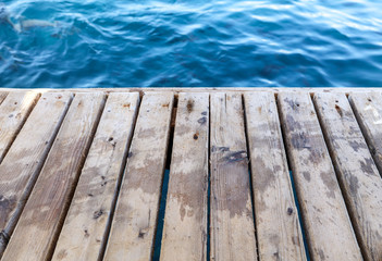 Wooden background and blue sea