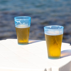 Two glasses of beer on the table