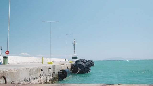 View of a concrete pier with buoy stock video