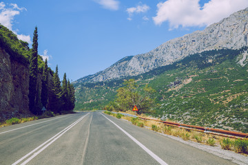 City Delphi. Greek Republic. Fields and mountains, grass and trees. In the distance mountains and sky. 13. Sep. 2019.