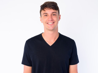 Face of happy young handsome man smiling