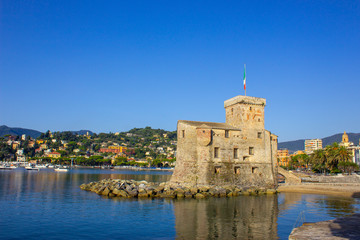 italian castles on sea italian flag - castle of Rapallo , Liguria Genoa Tigullio gulf near...