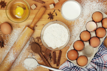Food ingredients for baking: flour, eggs, milk, sugar