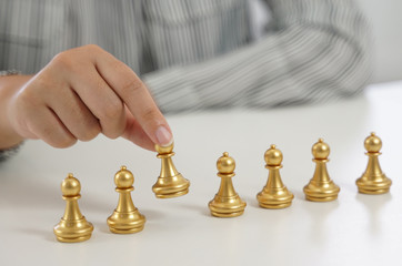 Business play with chess game. success management concept of business strategy and tactic challenge