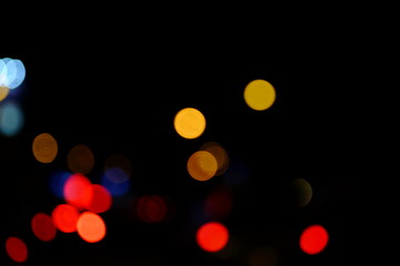 Abstract blurred of blue and silver glittering shine bulbs lights background:blur of Christmas wallpaper decorations concept.christmas light night