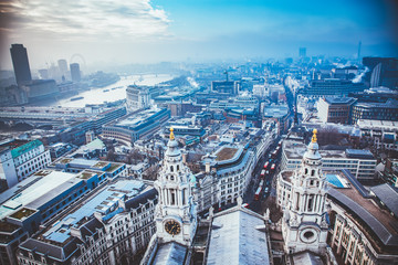 rooftop view over London on a foggy day from St Paul's cathedral, UK