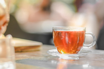 cup of tea at a cafe blurred background