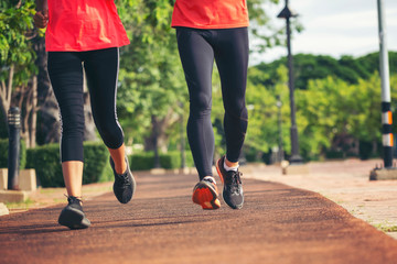 Fototapeta premium Couples who take care of their health by exercising happily in the city. Health care concept