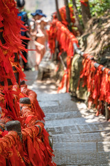 Fototapeta na wymiar Red ribbons along trail in mountains in Zhangjiajie