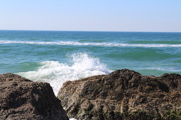 waves crashing on rocks