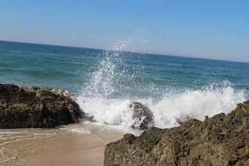 waves crashing on the rocks