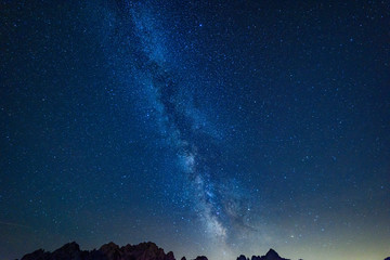Obraz na płótnie Canvas Mount Lussari. Clear and starry sky. Our galaxy. Milky Way. Italy