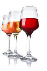 Glasses of different wine on white background
