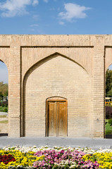 Brick wall & sidewalk of Siosepol bridge, Isfahan, Iran