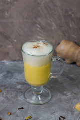 Turmeric latte mix, golden milk. Trendy coffee alternative concept.