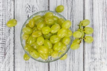 Portion of healthy White Grapes (selective focus; close-up shot)