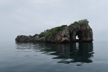 Naklejka premium Island with a heart shaped hole in the sea of Chumphon, Thailand