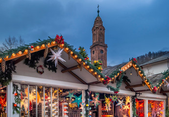 Christmas market at the University square in the old town of Heidelberg, with Castle Heidelberg,...