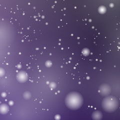 Abstract violet background with glowing particles.