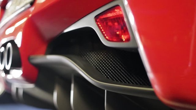 Red car modern design three exhaustion pipes