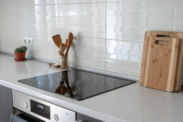 Kitchen with built in ceramic induction stove