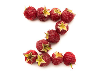 Isolated alphabet letter lined with fresh raspberries