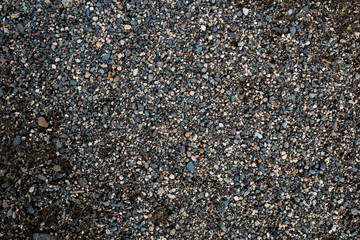 The texture of a shallow river stone. Pebble Background Image