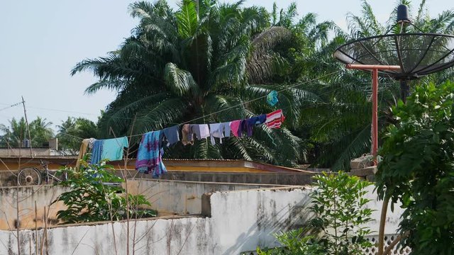 Laundry hanging outside on a clothes line in Atakpame, Togo.
