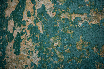 Texture of an old wall covered with paint. Background image of a worn paint coated surface