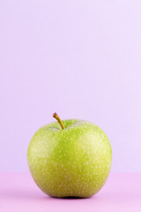 Creative layout made of green apples. Flat lay. Food concept.