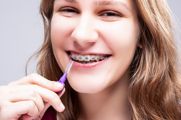 Teenager Girl Using Bristle Toothbrush for Cleaning