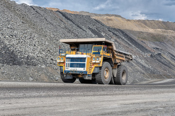 Quarry truck carries coal mined.