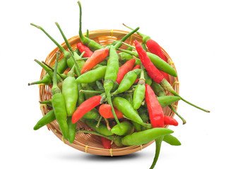 Red and green chilli peppers on white background